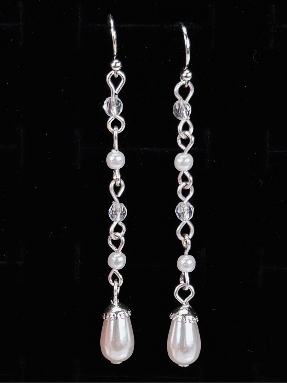Feminine lightweight Silvertone faux pearl long drop pierced earrings